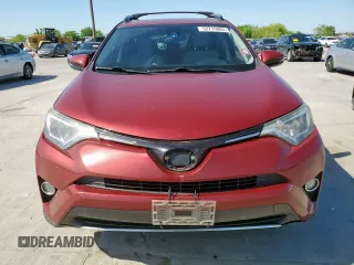 2018 Toyota RAV4 XLE with VIN JTMRFREV4JD234778, listed as a Copart auction lot 52715065 with 131,407 mi miles and Salvage Title. Bid and sale history available at carsss.com. Image 5.