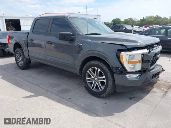 2021 Ford F-150 XL with VIN 1FTEW1CP3MFA80786, listed as a IAAI auction lot 42061952 with 32,071 mi miles. Bid and sale history available at carsss.com. Image 1.