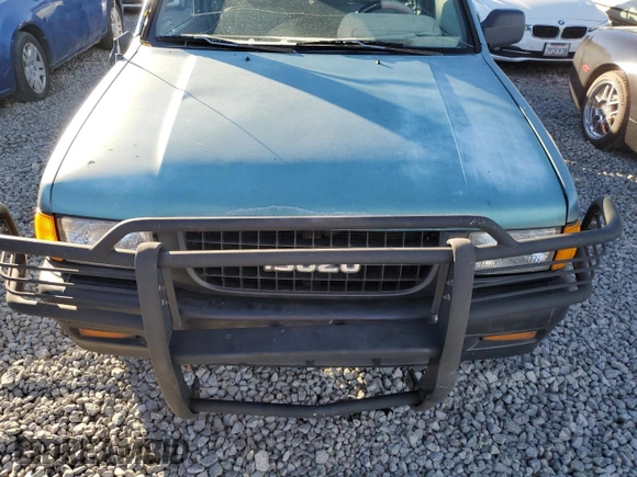 1994 Isuzu Rodeo LS with VIN 4S2CY58V7R4327413, listed as a Copart auction lot 79347724 with 175,944 mi miles and Salvage Title. Bid and sale history available at DreamBid. Image 11.