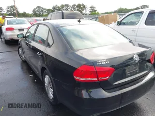 2014 Volkswagen Passat Wolfsburg Edition with VIN 1VWAS7A37EC097863, listed as a IAAI auction lot 42251601 with 106,454 mi miles and . Bid and sale history available at DreamBid. Image 3.