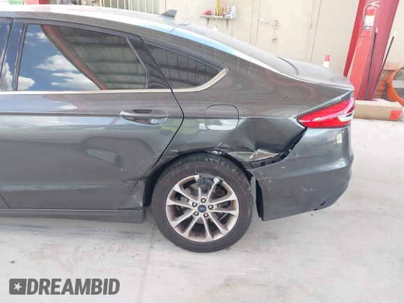 2019 Ford Fusion SE with VIN 3FA6P0HDXKR162353, listed as a IAAI auction lot 41970142 with 90,411 mi miles. Bid and sale history available at carsss.com. Image 6.