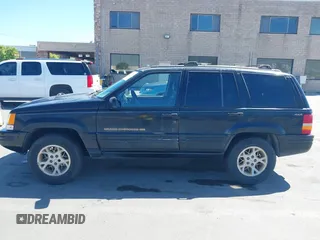 1997 Jeep Grand Cherokee Limited z VIN 1J4GZ78Y3VC683674, wystawiony jako IAAI lot #42331984 z przebiegiem 227 226 mil mil oraz . Historia ofert i sprzedaży dostępna na DreamBid. Obrazek 14.