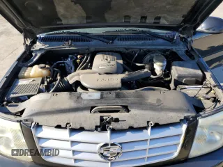 2003 Cadillac Escalade with VIN 1GYEC63T43R157689, listed as a Copart auction lot 88749145 with 138,905 mi miles and Salvage title. Bid and sale history available at DreamBid. Image 12.