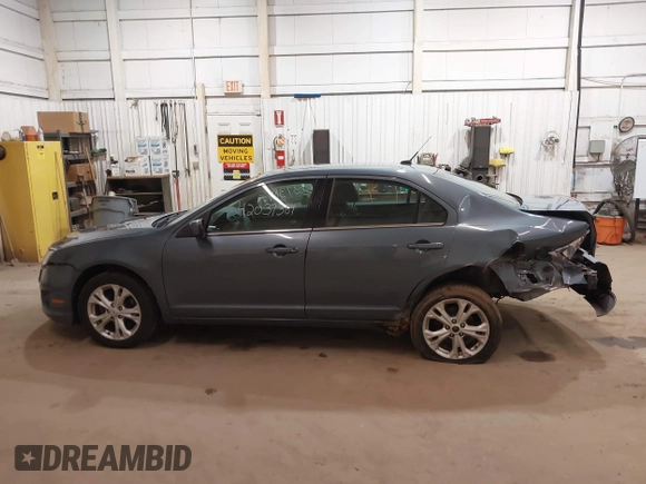 2012 Ford Fusion SE z VIN 3FAHP0HA9CR180004, wystawiony jako IAAI lot #42037384 z przebiegiem 111 262 mil mil oraz . Historia ofert i sprzedaży dostępna na DreamBid. Obrazek 14.