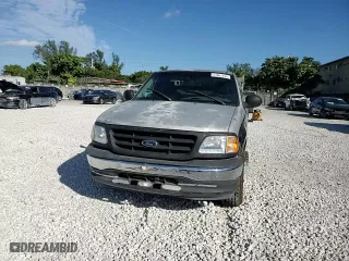 1999 Ford F-150 Work Series with VIN 1FTRF17W0XKB76972, listed as a Copart auction lot 41667295 with 0 mi miles and Salvage Title. Bid and sale history available at carsss.com. Image 11.