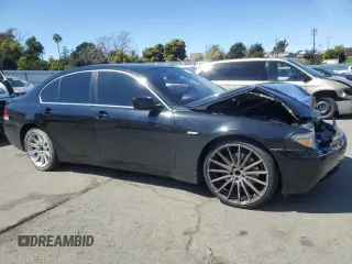 2003 BMW 7 Series 745i with VIN WBAGL634X3DP63533, listed as a Copart auction lot 49538815 with 126,926 mi miles and Salvage Title. Bid and sale history available at carsss.com. Image 4.