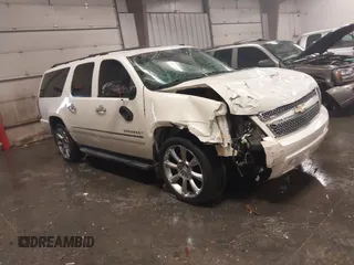 2010 Chevrolet Suburban LTZ with VIN 1GNUKKE32AR271253, listed as a IAAI auction lot 41161374 with 164,184 mi miles. Bid and sale history available at carsss.com. Image 1.