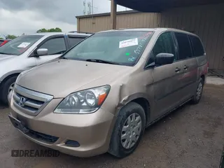 2005 Honda Odyssey LX with VIN 5FNRL382X5B116840, listed as a IAAI auction lot 42070477 with 268,898 mi miles. Bid and sale history available at carsss.com. Image 2.