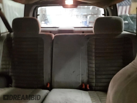 1995 Jeep Grand Cherokee Laredo with VIN 1J4GZ58S6SC630947, listed as a Copart auction lot 82143564 with 267,946 mi miles and Salvage Title. Bid and sale history available at carsss.com. Image 10.