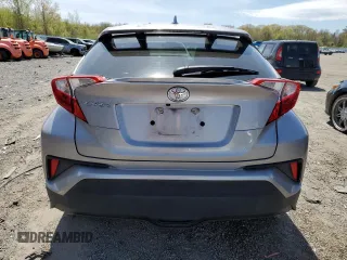 2018 Toyota C-HR XLE z VIN NMTKHMBX8JR001011, wystawiony jako Copart lot #55469265 z przebiegiem 106 938 mil mil oraz Szkoda całkowita • Salvage title. Historia ofert i sprzedaży dostępna na DreamBid. Obrazek 6.