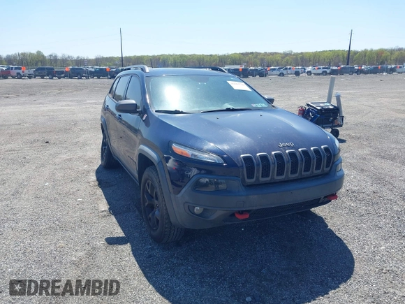 2015 Jeep Cherokee Trailhawk z VIN 1C4PJMBS3FW520829, wystawiony jako IAAI lot #42065548 z przebiegiem 90 534 mil mil oraz . Historia ofert i sprzedaży dostępna na DreamBid. Obrazek 1.