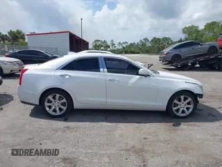 2016 Cadillac ATS Standard AWD z VIN 1G6AG5RX9G0106151, wystawiony jako IAAI lot #41710613 z przebiegiem 82 893 mil mil oraz . Historia ofert i sprzedaży dostępna na DreamBid. Obrazek 14.