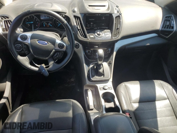 2013 Ford Escape SEL with VIN 1FMCU9HX1DUC79086, listed as a Copart auction lot 57312515 with 124,928 mi miles and Salvage title. Bid and sale history available at DreamBid. Image 8.