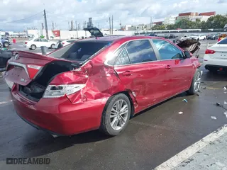 2015 Toyota Camry Hybrid LE with VIN 4T1BD1FK7FU155931, listed as a IAAI auction lot 41794523 with 90,730 mi miles. Bid and sale history available at carsss.com. Image 4.
