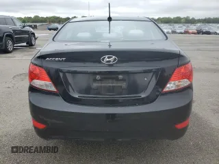 2014 Hyundai Accent GLS z VIN KMHCT4AE6EU705838, wystawiony jako Copart lot #58581515 z przebiegiem 40 265 mil mil oraz Szkoda całkowita • Salvage title. Historia ofert i sprzedaży dostępna na DreamBid. Obrazek 6.