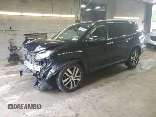 2017 Honda Pilot Touring z VIN 5FNYF6H91HB011030, wystawiony jako Copart lot #60236875 z przebiegiem 119 909 mil mil oraz Szkoda całkowita • Salvage title. Historia ofert i sprzedaży dostępna na DreamBid. Obrazek 1.