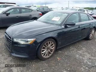 2013 Audi A6 Premium Plus with VIN WAUGFAFC4DN131779, listed as a IAAI auction lot 42373464 with 133,505 mi miles and . Bid and sale history available at DreamBid. Image 2.