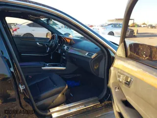 2014 Mercedes-Benz E-Class E 350 Sport with VIN WDDHF5KB2EB038828, listed as a IAAI auction lot 41238332 with 180,580 mi miles. Bid and sale history available at carsss.com. Image 5.