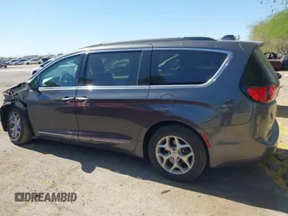 2017 Chrysler Pacifica Touring L with VIN 2C4RC1BG0HR826881, listed as a IAAI auction lot 42171240 with 214,188 mi miles and . Bid and sale history available at DreamBid. Image 14.