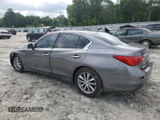 2014 Infiniti Q50 Premium with VIN JN1BV7APXEM675338, listed as a Copart auction lot 57125045 with 58,267 mi miles and Salvage title. Bid and sale history available at DreamBid. Image 2.