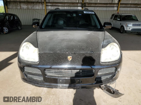 2006 Porsche Cayenne S with VIN WP1AB29P56LA66639, listed as a Copart auction lot 52097595 with 180,827 mi miles and Salvage title. Bid and sale history available at DreamBid. Image 5.