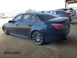 2008 BMW 5 Series 550i with VIN WBANW53598CT48525, listed as a Copart auction lot 48611945 with 103,546 mi miles and Salvage Title. Bid and sale history available at carsss.com. Image 2.