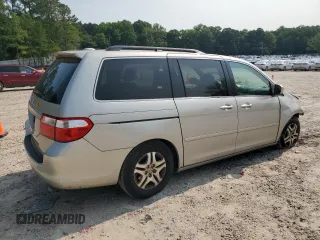 2006 Honda Odyssey EX-L with VIN 5FNRL38706B037805, listed as a Copart auction lot 57390365 with 219,554 mi miles and Salvage title. Bid and sale history available at DreamBid. Image 3.