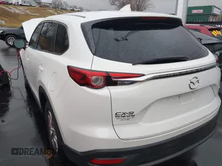 2016 Mazda CX-9 Sport with VIN JM3TCABY4G0123931, listed as a IAAI auction lot 41710045 with 161,109 mi miles. Bid and sale history available at carsss.com. Image 4.