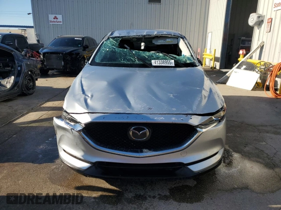 2018 Mazda CX-5 Touring with VIN JM3KFACM6J1431330, listed as a Copart auction lot 41338955 with 0 mi miles and Salvage Title. Bid and sale history available at carsss.com. Image 5.