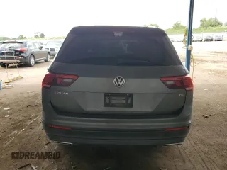 2018 Volkswagen Tiguan S with VIN 3VV1B7AXXJM054778, listed as a Copart auction lot 61294795 with 87,330 mi miles and Salvage title. Bid and sale history available at DreamBid. Image 6.