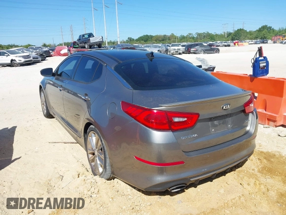 2015 Kia Optima SX Turbo with VIN 5XXGR4A63FG384894, listed as a IAAI auction lot 41843637 with 101,364 mi miles and . Bid and sale history available at DreamBid. Image 3.