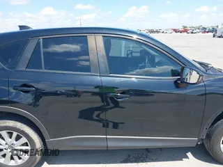 2014 Mazda CX-5 Sport with VIN JM3KE2BE9E0402015, listed as a IAAI auction lot 42098197 with 65,328 mi miles and . Bid and sale history available at carsss.com. Image 14.