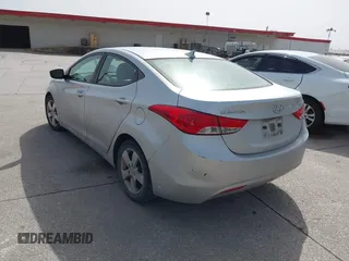2013 Hyundai Elantra GLS z VIN 5NPDH4AE6DH257524, wystawiony jako IAAI lot #41755876 z przebiegiem 198 554 mil mil oraz . Historia ofert i sprzedaży dostępna na DreamBid. Obrazek 3.