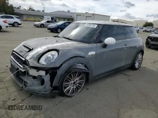 2015 MINI Hardtop S with VIN WMWXP7C56F2A40252, listed as a Copart auction lot 46606705 with 50,277 mi miles and Salvage Title. Bid and sale history available at DreamBid. Image 1.