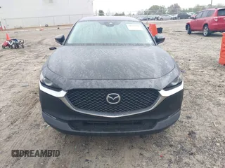 2020 Mazda CX-30 Select with VIN 3MVDMBCL3LM104988, listed as a IAAI auction lot 41951565 with 53,685 mi miles and . Bid and sale history available at DreamBid. Image 13.