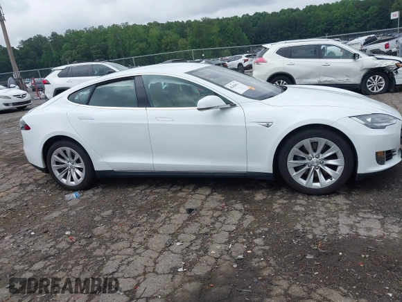2016 Tesla Model S 70 with VIN 5YJSA1E11GF132984, listed as a IAAI auction lot 42428634 with Not provided miles and . Bid and sale history available at DreamBid. Image 12.