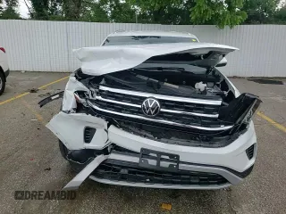 2023 Volkswagen Atlas SE z VIN 1V2HE2CA5PC204949, wystawiony jako Copart lot #59323505 z przebiegiem 17 689 mil mil oraz Szkoda całkowita • Salvage title. Historia ofert i sprzedaży dostępna na DreamBid. Obrazek 14.