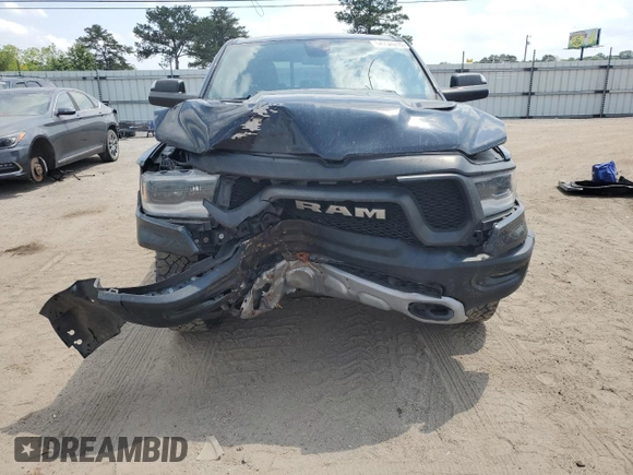 2019 Ram 1500 Rebel z VIN 1C6SRFLT8KN618140, wystawiony jako Copart lot #54734815 z przebiegiem 145 040 mil mil oraz Szkoda całkowita • Salvage title. Historia ofert i sprzedaży dostępna na DreamBid. Obrazek 5.