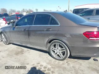 2014 Mercedes-Benz E 550 Sport with VIN WDDHF9BB5EA971894, listed as a IAAI auction lot 41405571 with 113,363 mi miles and . Bid and sale history available at DreamBid. Image 15.
