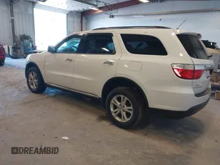 2013 Dodge Durango Crew with VIN 1C4RDHDG5DC553913, listed as a IAAI auction lot 42227189 with 209,703 mi miles and . Bid and sale history available at DreamBid. Image 3.