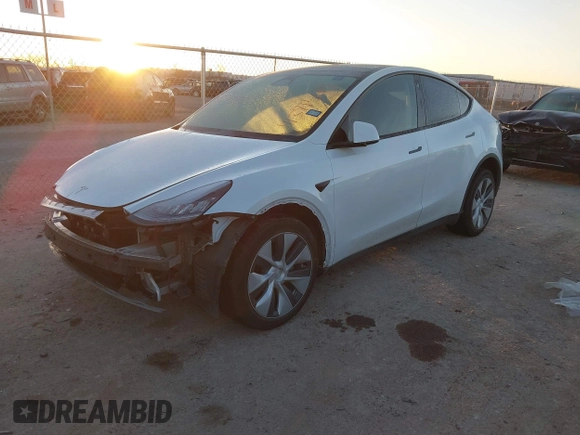 2023 Tesla Model Y Long Range z VIN 7SAYGDEE6PA061228, wystawiony jako IAAI lot #41371547 z przebiegiem 25 121 mil mil oraz . Historia ofert i sprzedaży dostępna na DreamBid. Obrazek 19.