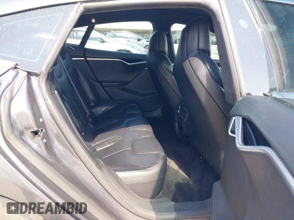 2017 Tesla Model S 100D with VIN 5YJSA1E29HF204881, listed as a IAAI auction lot 41785767 with 146,523 mi miles and . Bid and sale history available at DreamBid. Image 8.