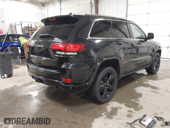 2015 Jeep Grand Cherokee Laredo with VIN 1C4RJFAG3FC115444, listed as a IAAI auction lot 41248211 with 138,828 mi miles. Bid and sale history available at carsss.com. Image 4.
