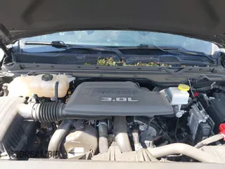 2021 Ram 1500 Big Horn z VIN 1C6RREFM5MN813578, wystawiony jako IAAI lot #42066531 z przebiegiem 77 207 mil mil oraz . Historia ofert i sprzedaży dostępna na DreamBid. Obrazek 10.