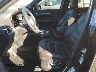 2023 Mazda CX-5 Signature with VIN JM3KFBXY1P0122544, listed as a Copart auction lot 83712034 with 27,032 mi miles and Salvage Title. Bid and sale history available at DreamBid. Image 7.