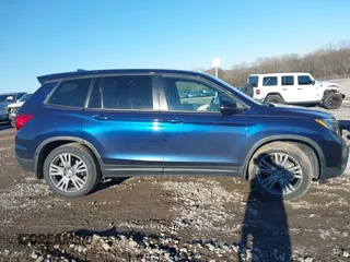 2019 Honda Passport EX-L with VIN 5FNYF7H50KB012132, listed as a IAAI auction lot 41327682 with 56,653 mi miles and . Bid and sale history available at carsss.com. Image 13.