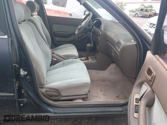 1993 Toyota Camry LE z VIN 4T1SK12E6PU248270, wystawiony jako IAAI lot #42160426 z przebiegiem 225 221 mil mil oraz . Historia ofert i sprzedaży dostępna na DreamBid. Obrazek 5.