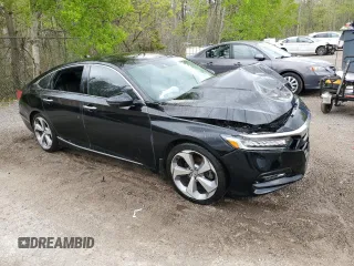 2019 Honda Accord Touring with VIN 1HGCV1F93KA804401, listed as a Copart auction lot 57152815 with 140,331 mi miles and Salvage title. Bid and sale history available at DreamBid. Image 4.