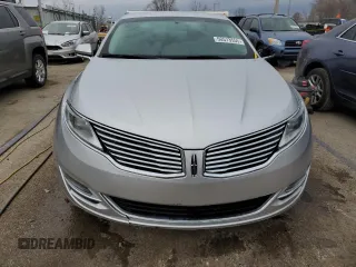2015 Lincoln MKZ with VIN 3LN6L2J99FR628945, listed as a Copart auction lot 50573555 with 139,644 mi miles and Salvage title. Bid and sale history available at DreamBid. Image 5.