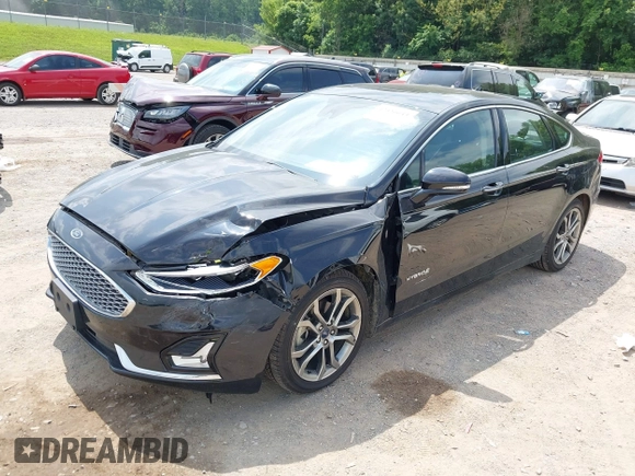 2019 Ford Fusion Titanium z VIN 3FA6P0RU0KR260239, wystawiony jako IAAI lot #42436643 z przebiegiem 114 631 mil mil oraz . Historia ofert i sprzedaży dostępna na DreamBid. Obrazek 6.